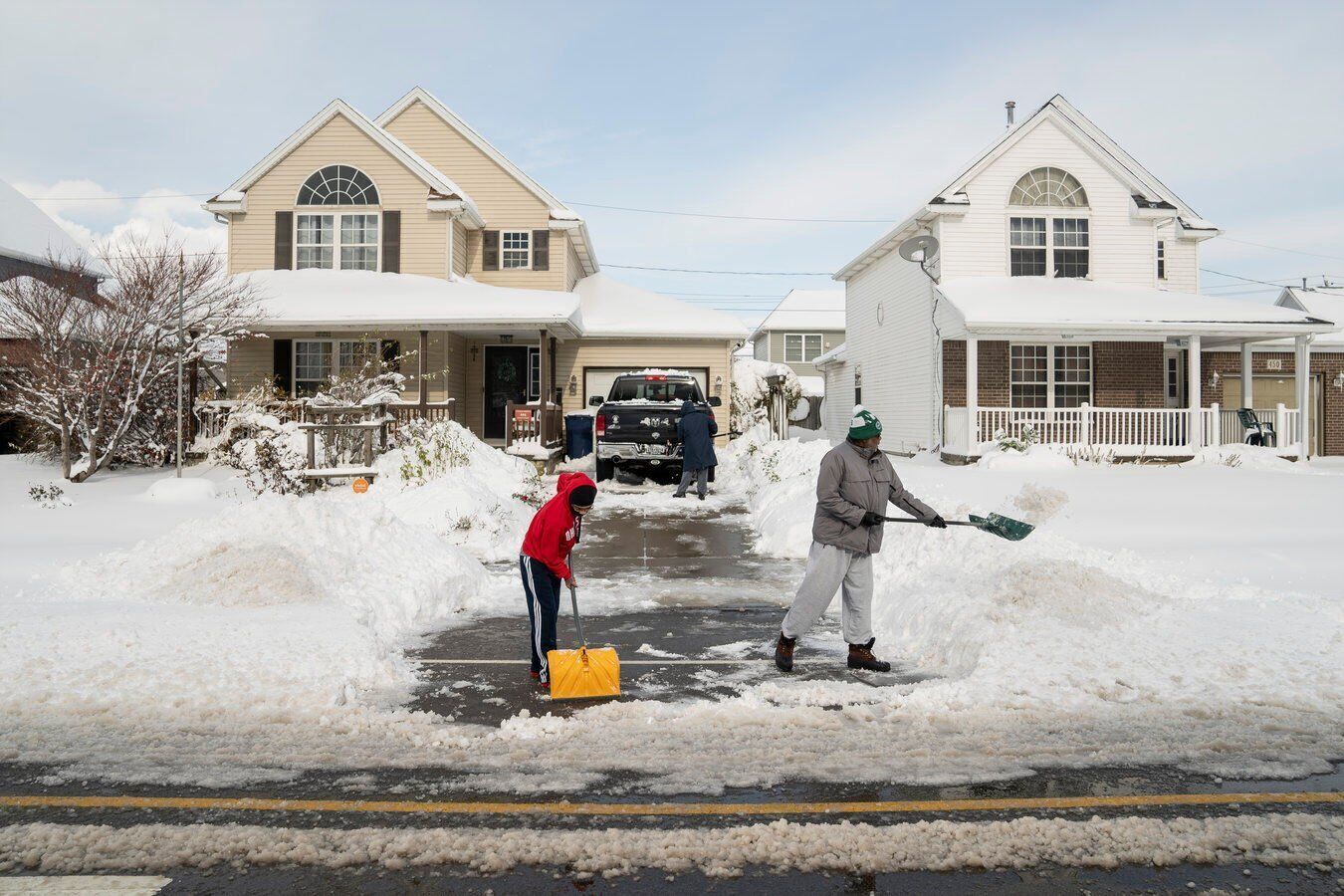 Working to clear the driveway